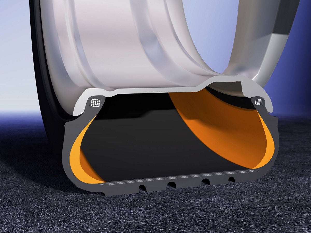 (imagem com ilustração em 3D de corte de pneu SSR -Self Supporting Run Flat)