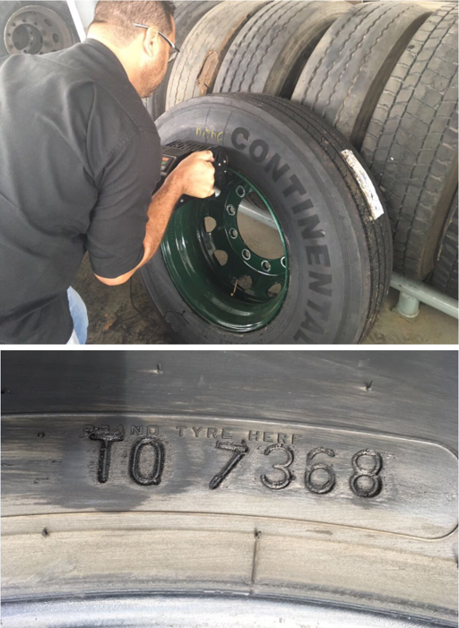 (imagem de homem utilizando equipamento para marcar a fogo o pneu)